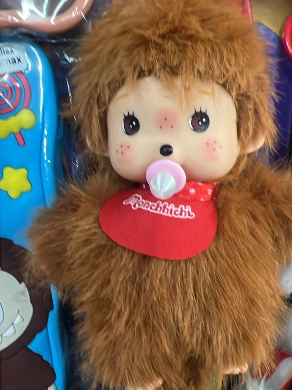 Plush Baby Doll - Brown with Red Bib